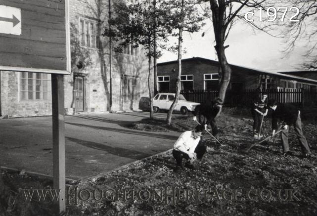 Young lads tidying up the front garden of the YMCA at Houghton Hall, guessed to be around 1972
