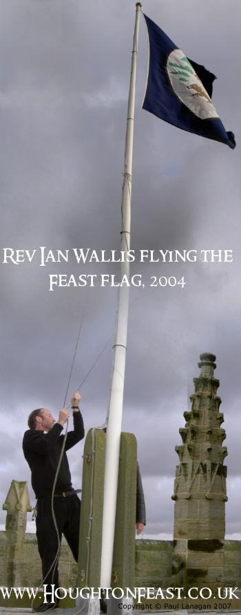 Flying the Houghton Feast flag from St Michael's Church tower in Oct 2004