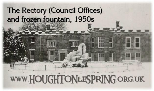 A snow covered Rectory and fountain in the 1950s