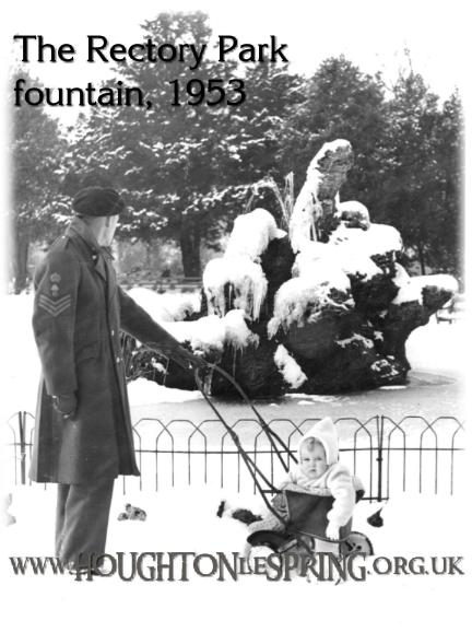 William Dobie and daughter, Barbara, in front of the frozen fountain, January 1953