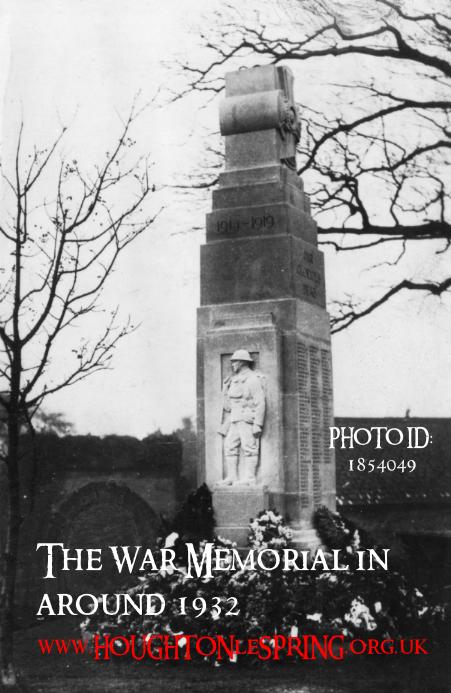 Houghton-le-Spring cenotaph surrounded by flowers in around 1932.  Note the Rectory archway in the background