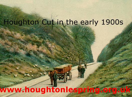 Travelling down Houghton Cut, in the early 1900s.  Imagine what it was like in the snow!  What is in the box on the cart?