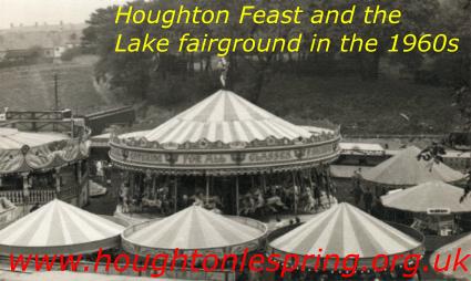 Roundstalls and rides at the Lake fairground during Houghton Feast 1963  The grounds of Heath House hostel can be seen in the background