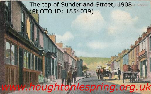A portion of Sunderland Street, Houghton-le-Spring, in the early 1900s. The business on the left is the Queen's Head public house, known locally as 'The Pillars'