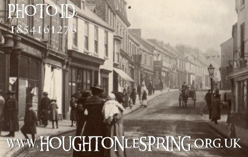 Folk gather at the bottom of Houghton's Sunderland Street, safe as there were no speeding cars in 1900!