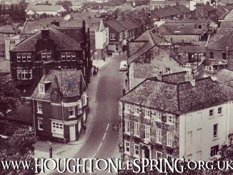 Looking at the White Lion pub from the Church tower